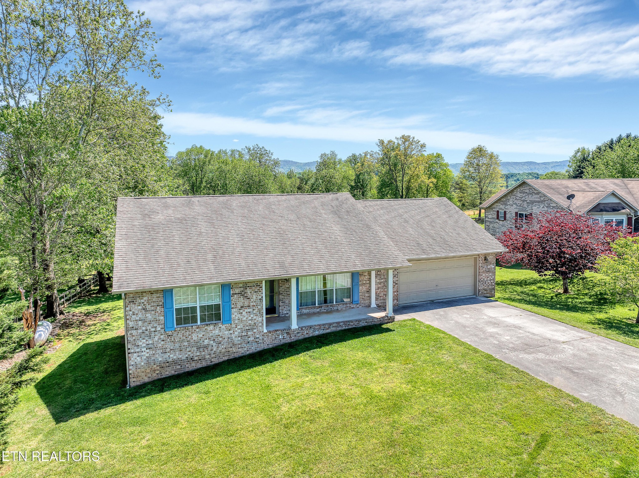 2036 Little Best Road Maryville, TN 37803 - Photo 3 of 54 a aerial view of a house with swimming pool and a yard