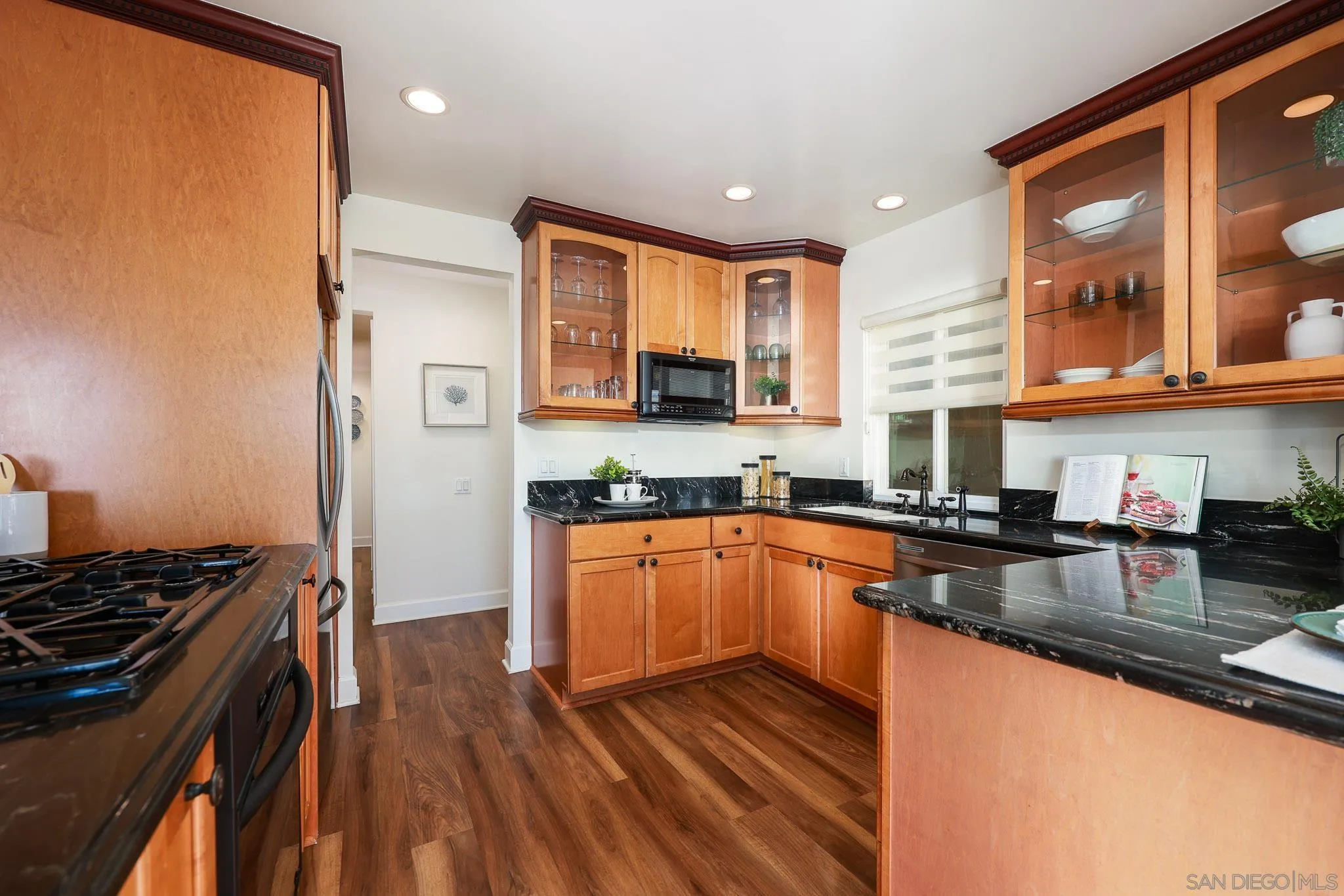 234 Turf View Drive Solana Beach, CA 92075 - Photo 10 of 29 a kitchen with stainless steel appliances granite countertop a stove and a sink