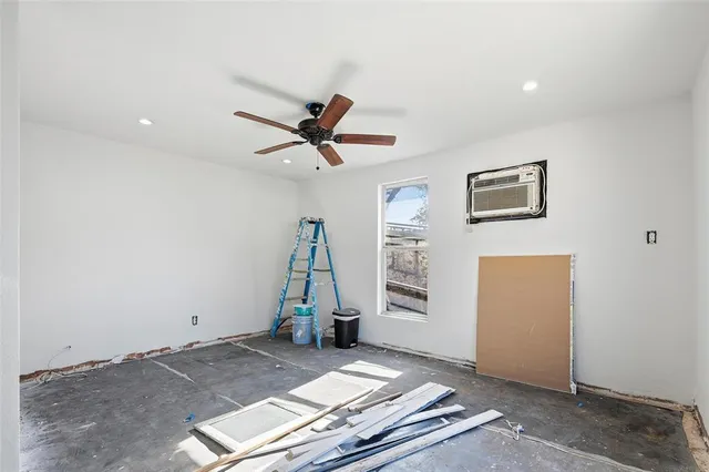 a view of a livingroom with a hall and a window