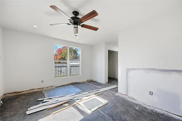 an empty room with windows