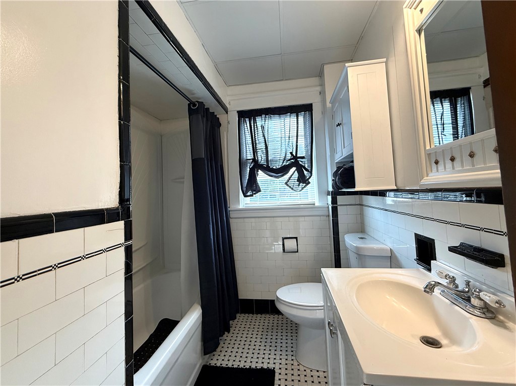 32 Lucas Street Pawtucket, RI 02860 - Photo 15 of 26 Bathroom with tub/shower