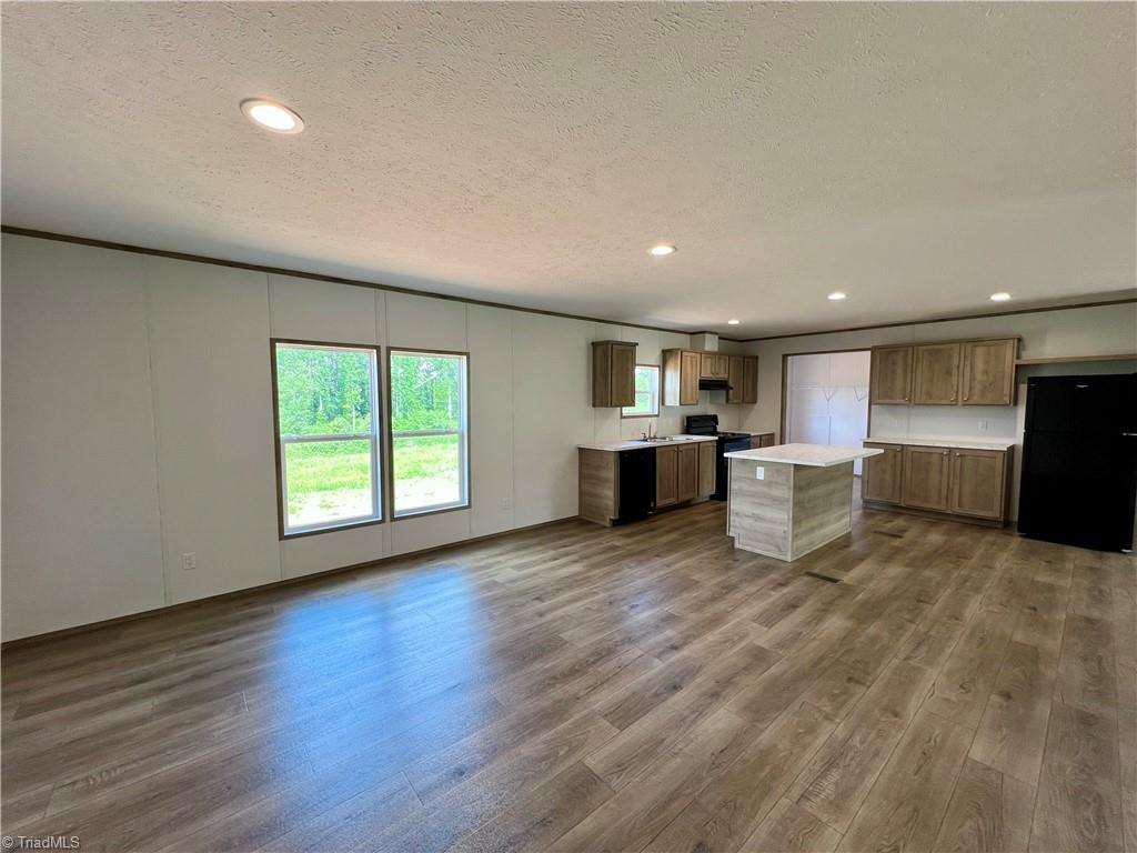 188 Trivette Road Harmony, NC 28634 - Photo 6 of 24 kitchen and flex space