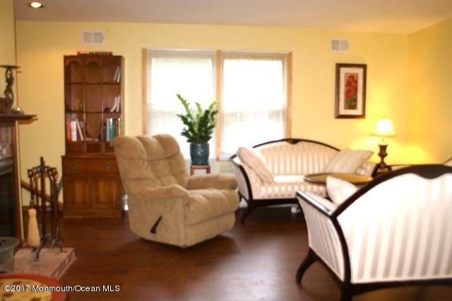 129 Frank Applegate Road Jackson, NJ 08527 - Photo 12 of 28 a living room with furniture and a window