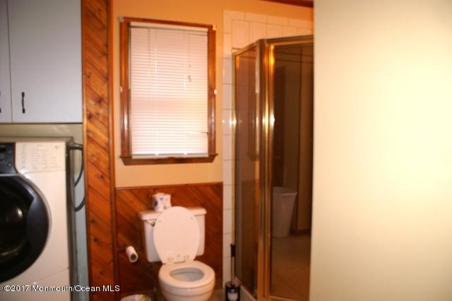 129 Frank Applegate Road Jackson, NJ 08527 - Photo 18 of 28 a bathroom with a toilet and a shower