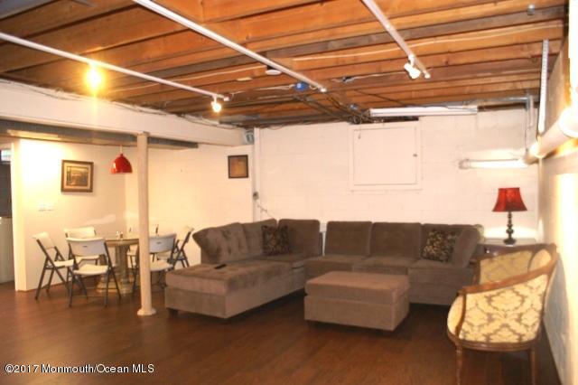 129 Frank Applegate Road Jackson, NJ 08527 - Photo 25 of 28 a living room with furniture and a window