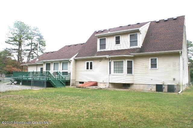 129 Frank Applegate Road Jackson, NJ 08527 - Photo 27 of 28 a front view of house with yard and outdoor seating