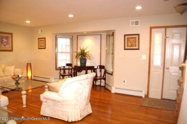 129 Frank Applegate Road Jackson, NJ 08527 - Photo 5 of 28 a living room with furniture and wooden floor