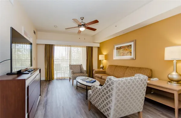 a living room with furniture and a window