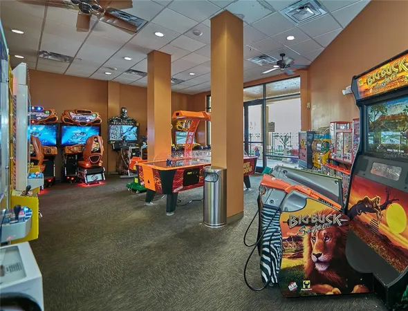 a room with gym equipment and a table