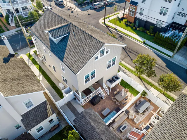 an aerial view of a house with a garden