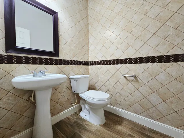 a bathroom with a sink and a toilet