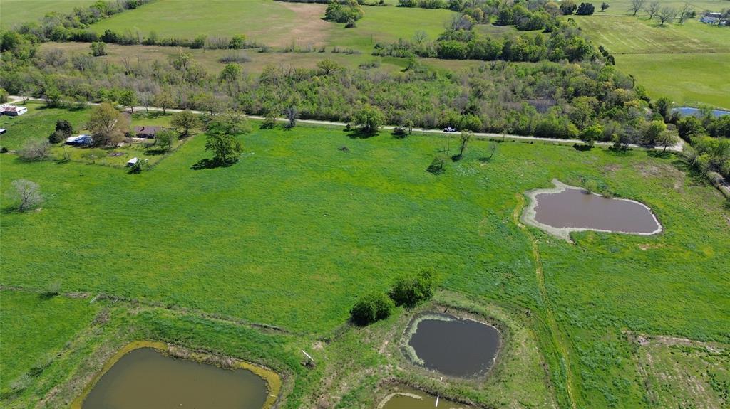 Lot 4 County Road 3410 Emory, TX 75440 - Photo 14 of 27 an aerial view of residential house with outdoor space and street view