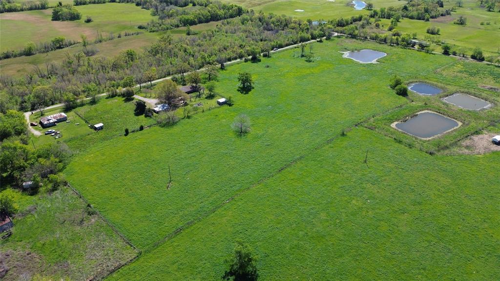 Lot 4 County Road 3410 Emory, TX 75440 - Photo 18 of 27 a view of a golf course with a lake