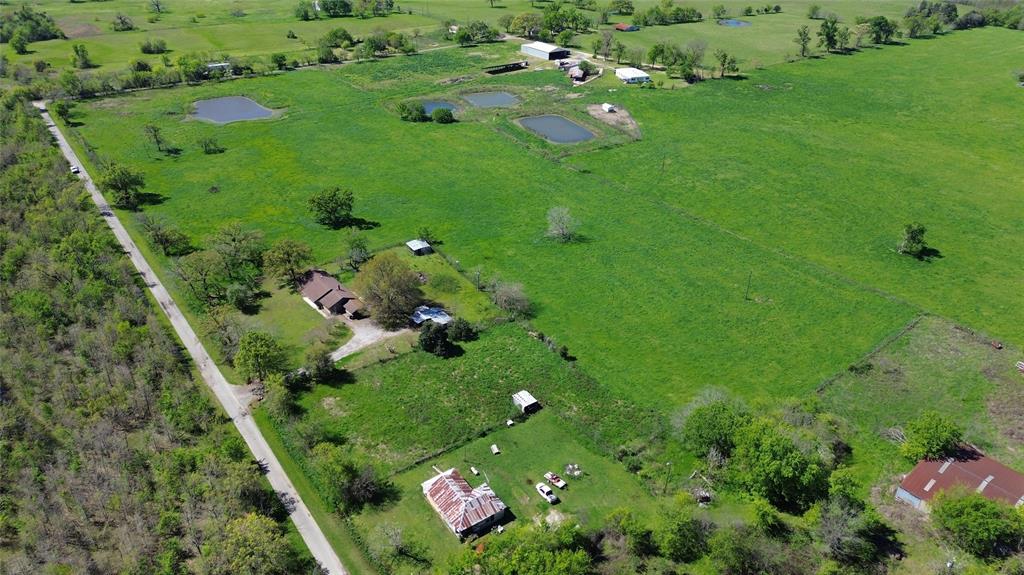 Lot 4 County Road 3410 Emory, TX 75440 - Photo 23 of 27 a backyard of a house with lots of green space