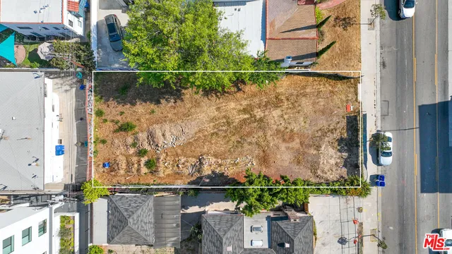 a view of street from balcony