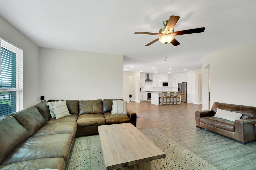 1601 Bear Path Way Gunter, TX 75058 - Photo 14 of 40 a living room with furniture and a large window