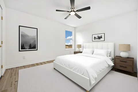 a living room with furniture and white walls