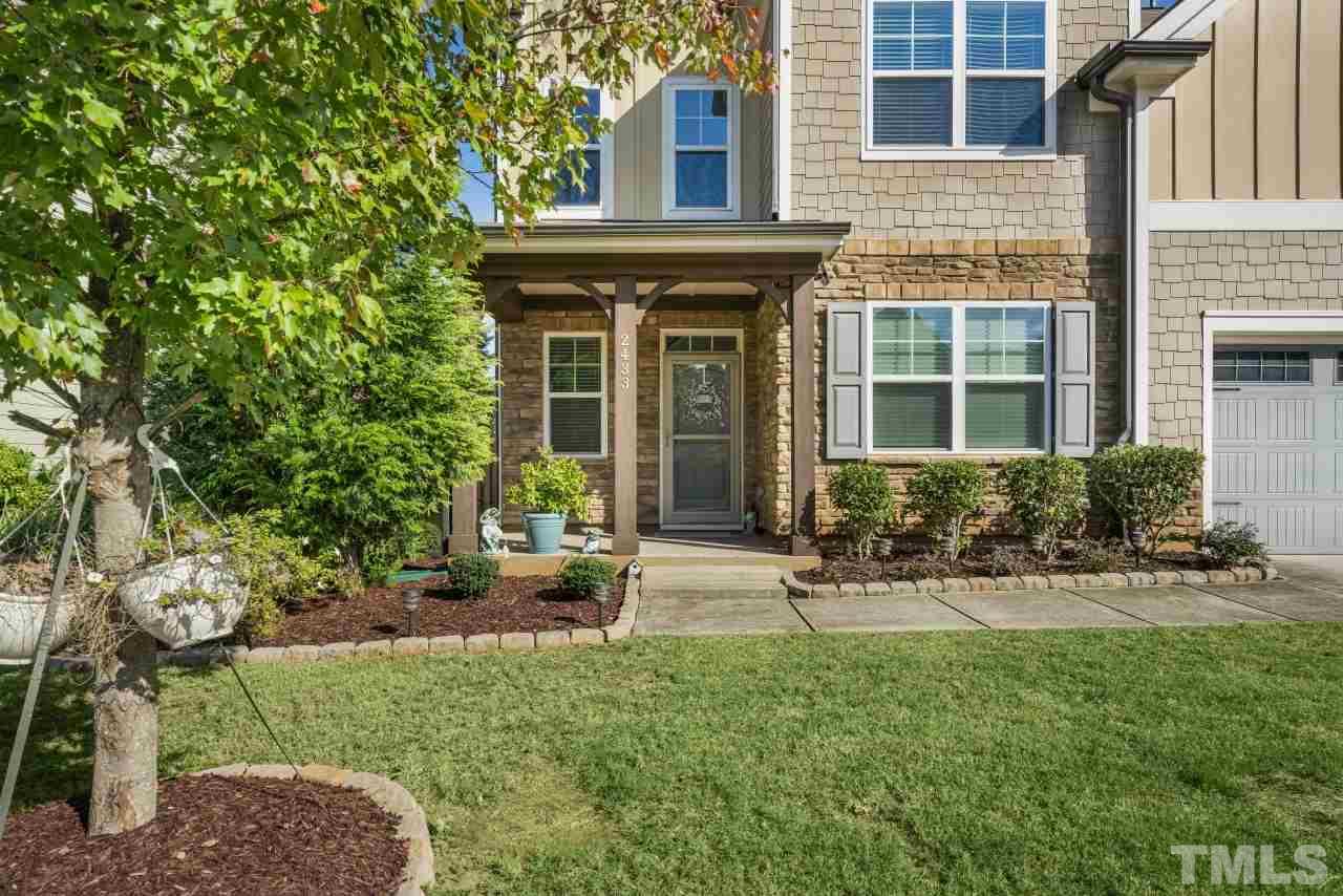 2433 Pilsley Road Apex, NC 27539 - Photo 2 of 28 front view of a brick house with a yard