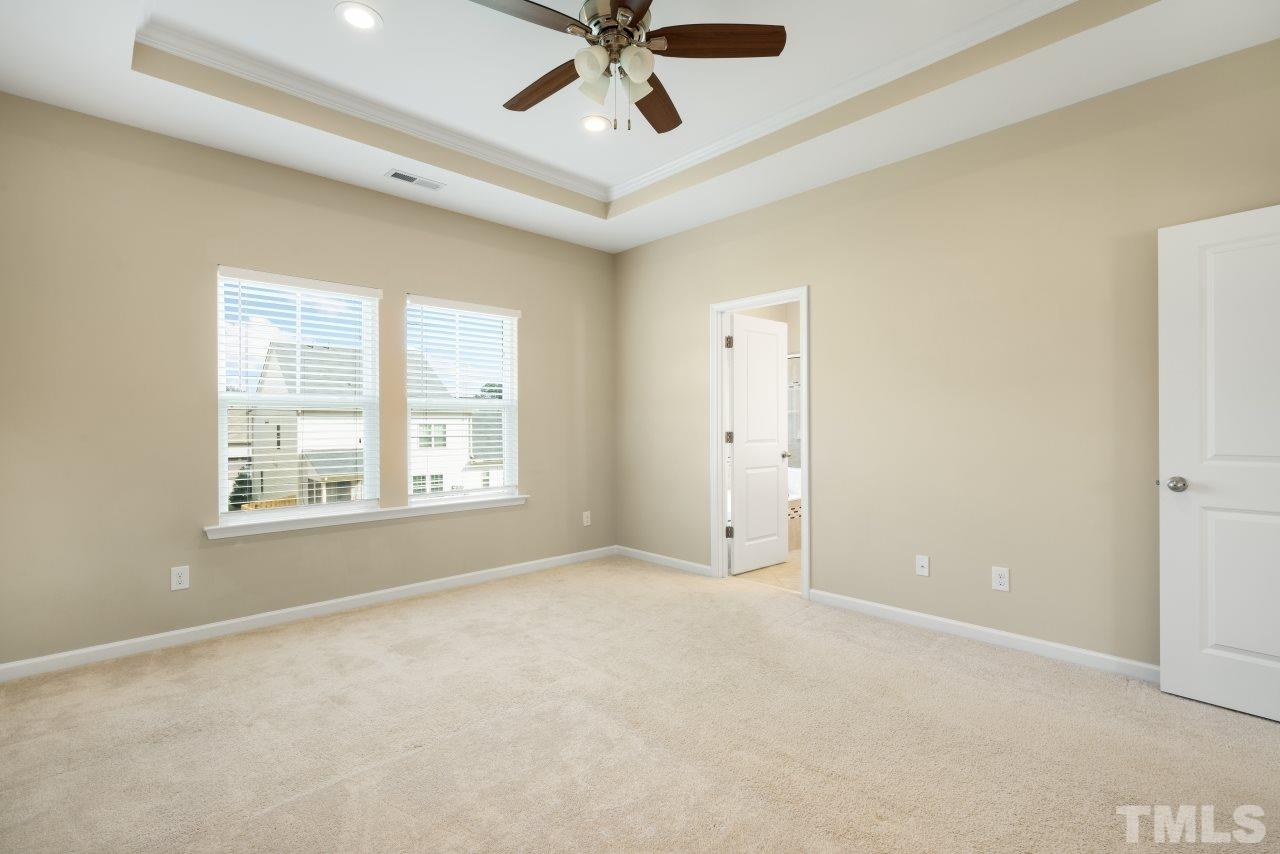 2433 Pilsley Road Apex, NC 27539 - Photo 15 of 28 a view of an empty room with a window
