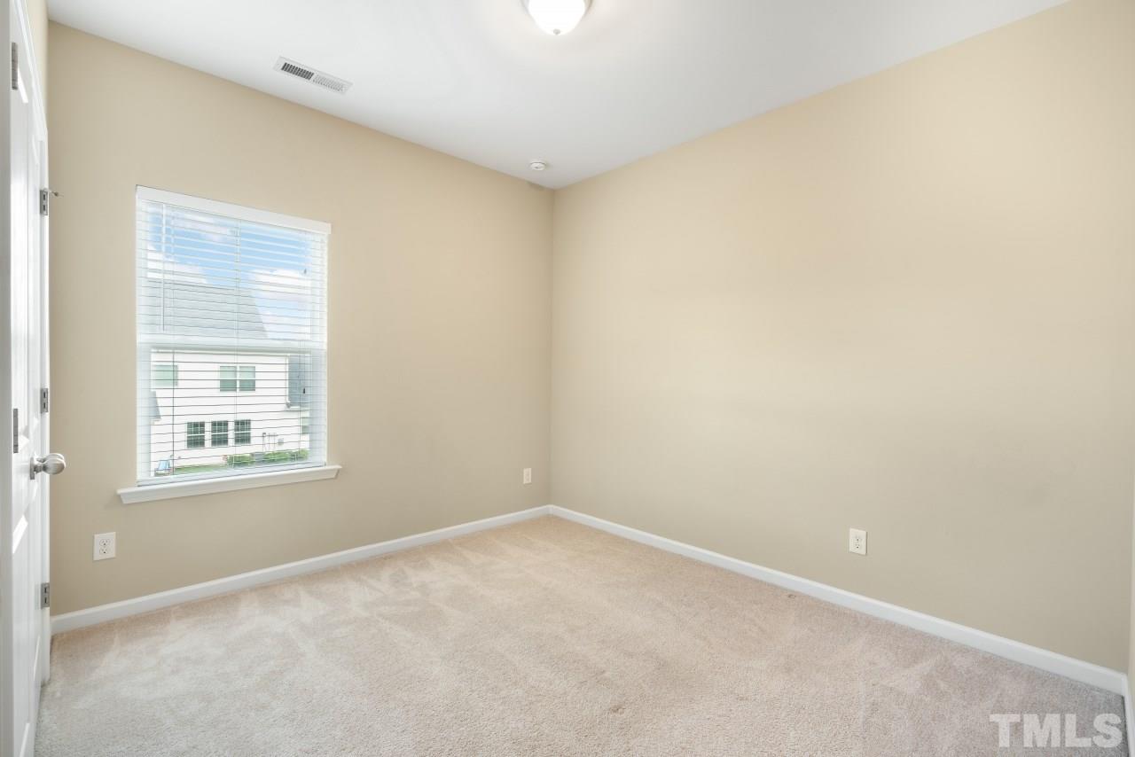 2433 Pilsley Road Apex, NC 27539 - Photo 19 of 28 an empty room with a window