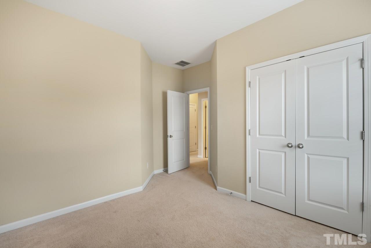2433 Pilsley Road Apex, NC 27539 - Photo 21 of 28 a view of an empty room