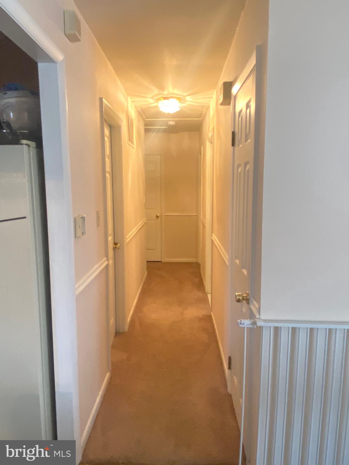 7605 Laurel Ridge Court Laurel, MD 20707 - Photo 9 of 34 main level hallway