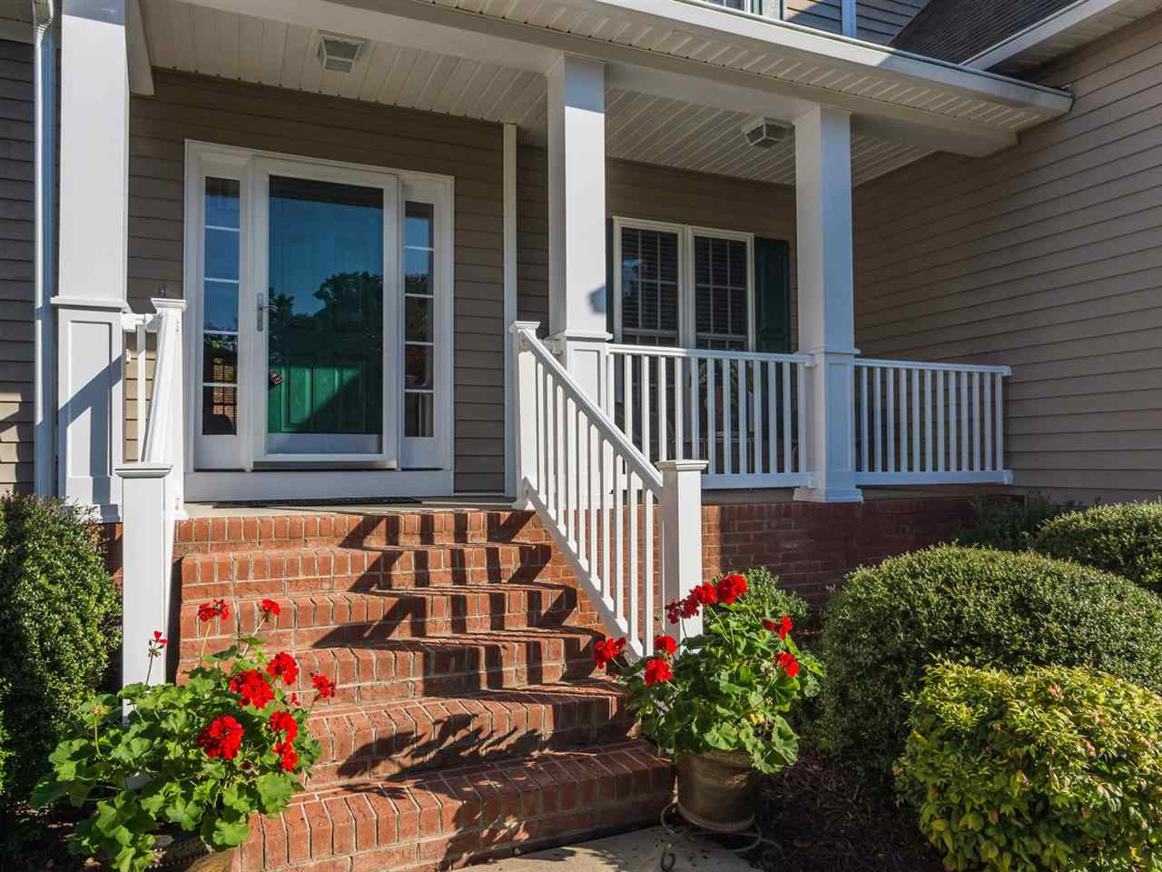 1503 Patterson Grove Road Apex, NC 27502 - Photo 2 of 25 The rocking chair front porch is a wonderful place to welcome guests to your home. Porch