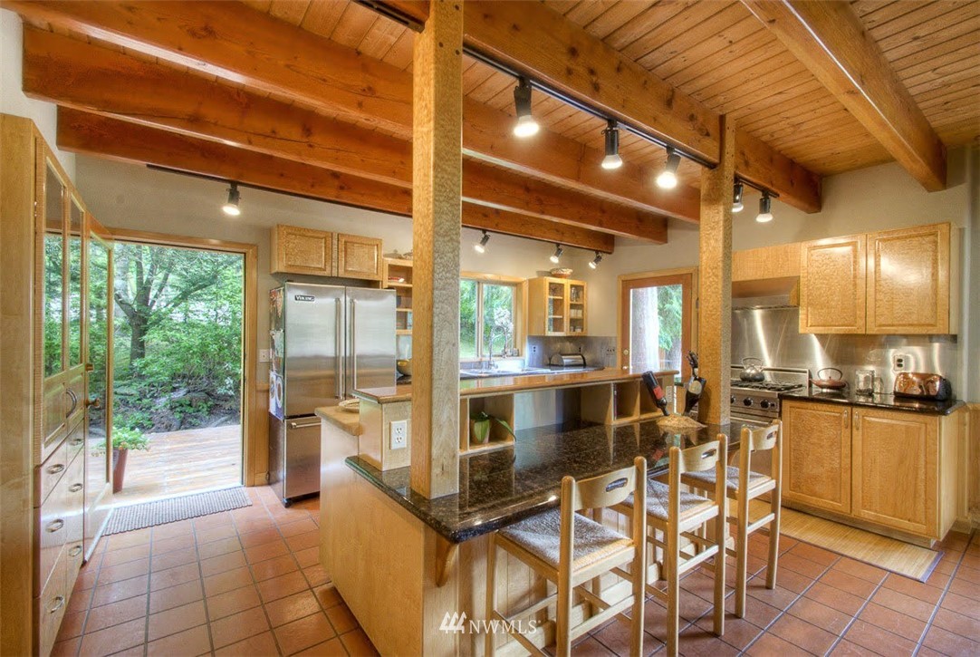 485 Whitecap Road Bellingham, WA 98229 - Photo 2 of 25 a room with lots of chairs and mirrors