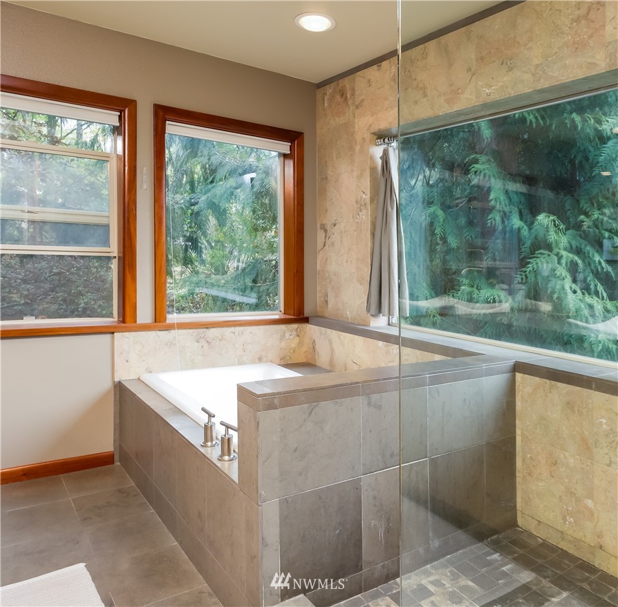 485 Whitecap Road Bellingham, WA 98229 - Photo 12 of 25 a bathroom with a tub sink and large window
