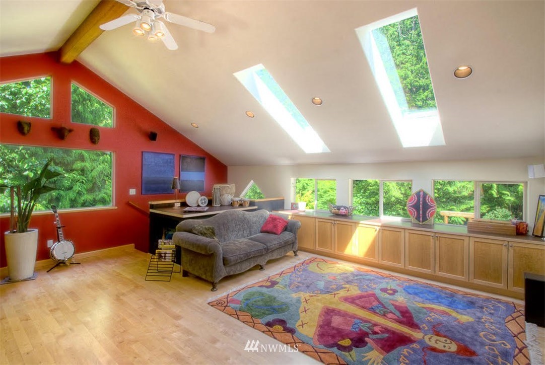 485 Whitecap Road Bellingham, WA 98229 - Photo 13 of 25 a living room filled with furniture and a rug