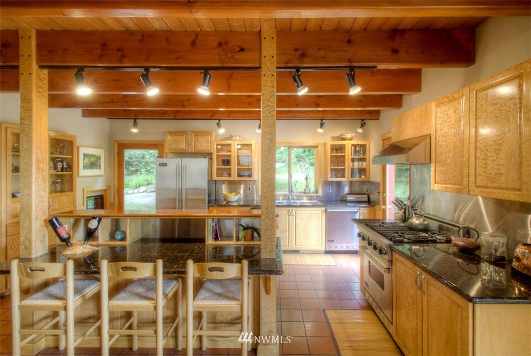 485 Whitecap Road Bellingham, WA 98229 - Photo 3 of 25 a kitchen with stainless steel appliances a sink and cabinets