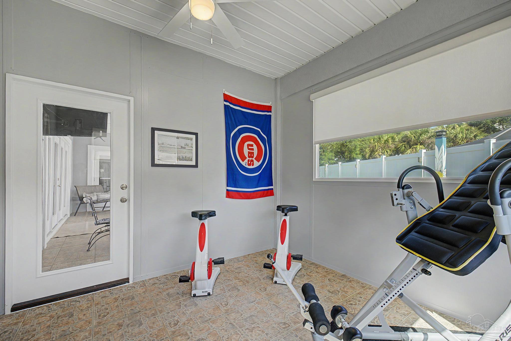 2005 Riviera Lane South Navarre, FL 32566 - Photo 20 of 70 a view of a room with gym equipment