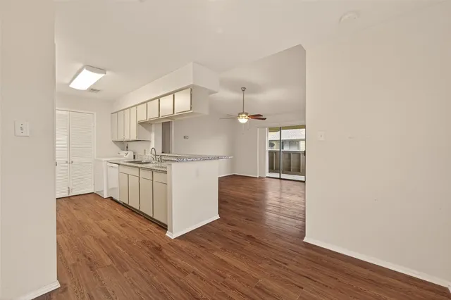 a view of a swimming pool with chairs