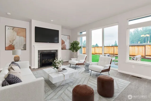 a kitchen with kitchen island a counter top space stainless steel appliances and cabinets