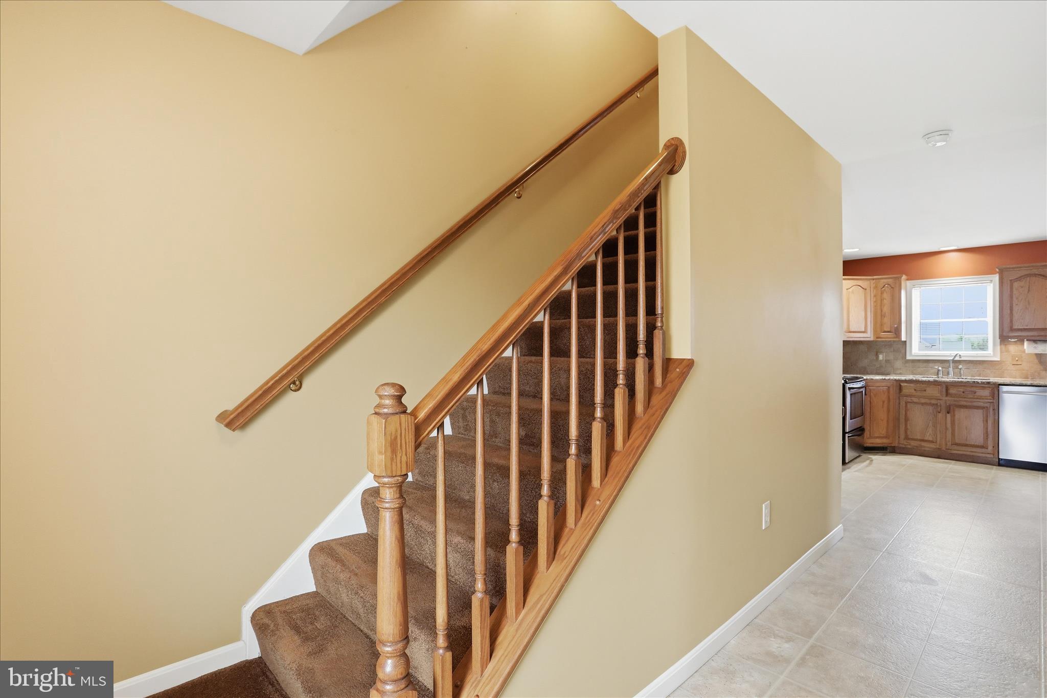 2309 Hafer Road, Unit 1 Fayetteville, PA 17222 - Photo 18 of 47 a view of a hallway with wooden floor and staircase