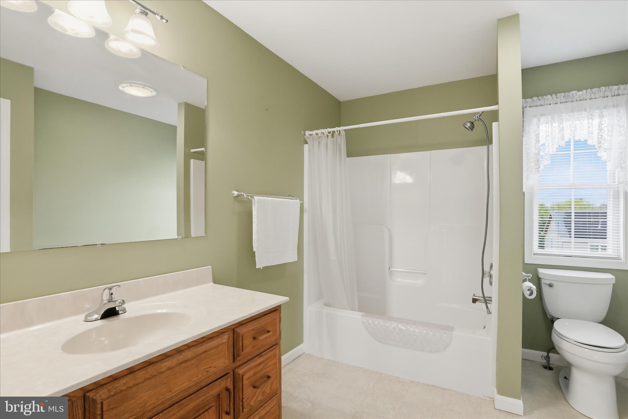 2309 Hafer Road, Unit 1 Fayetteville, PA 17222 - Photo 27 of 47 a bathroom with a sink toilet and shower