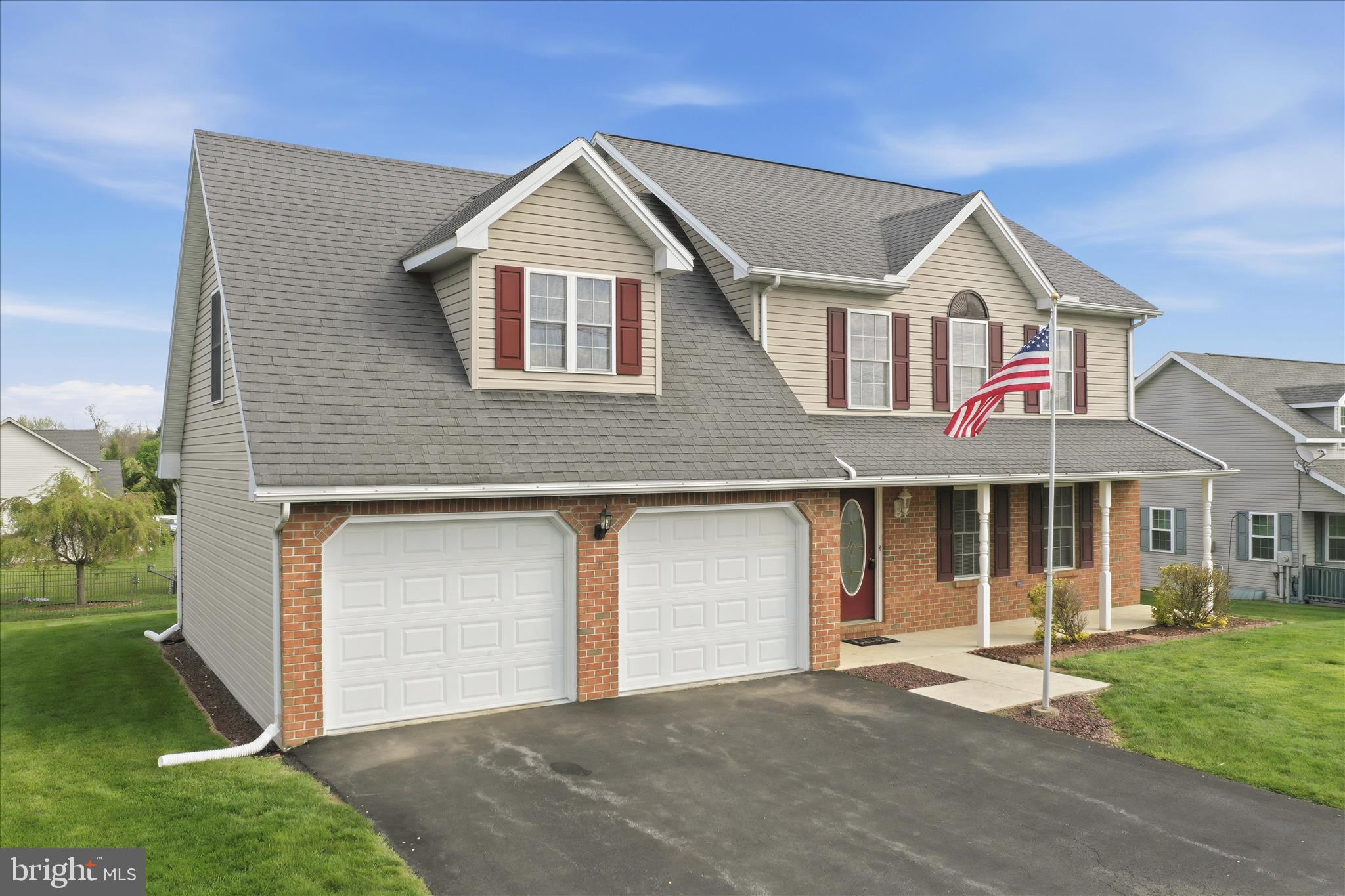 2309 Hafer Road, Unit 1 Fayetteville, PA 17222 - Photo 5 of 47 a front view of a house with a yard and garage