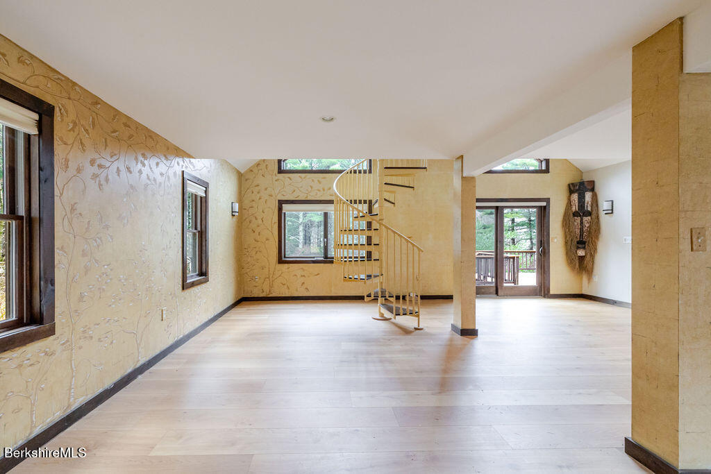 9 Bott Hill Road Egremont, MA 01230 - Photo 17 of 47 a view of a hallway with wooden floor and a cabinet