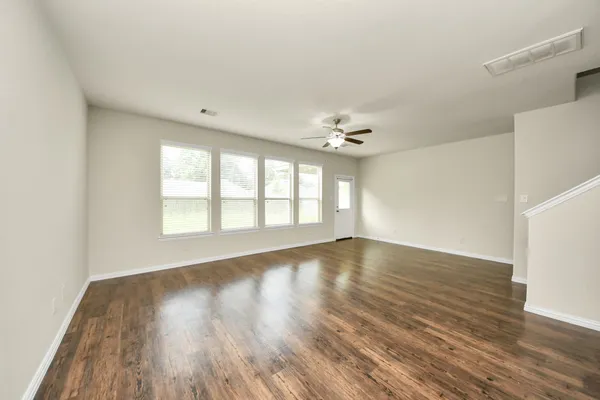 a view of a kitchen with a sink and a stove top oven