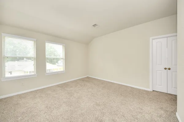 an empty room with an entryway