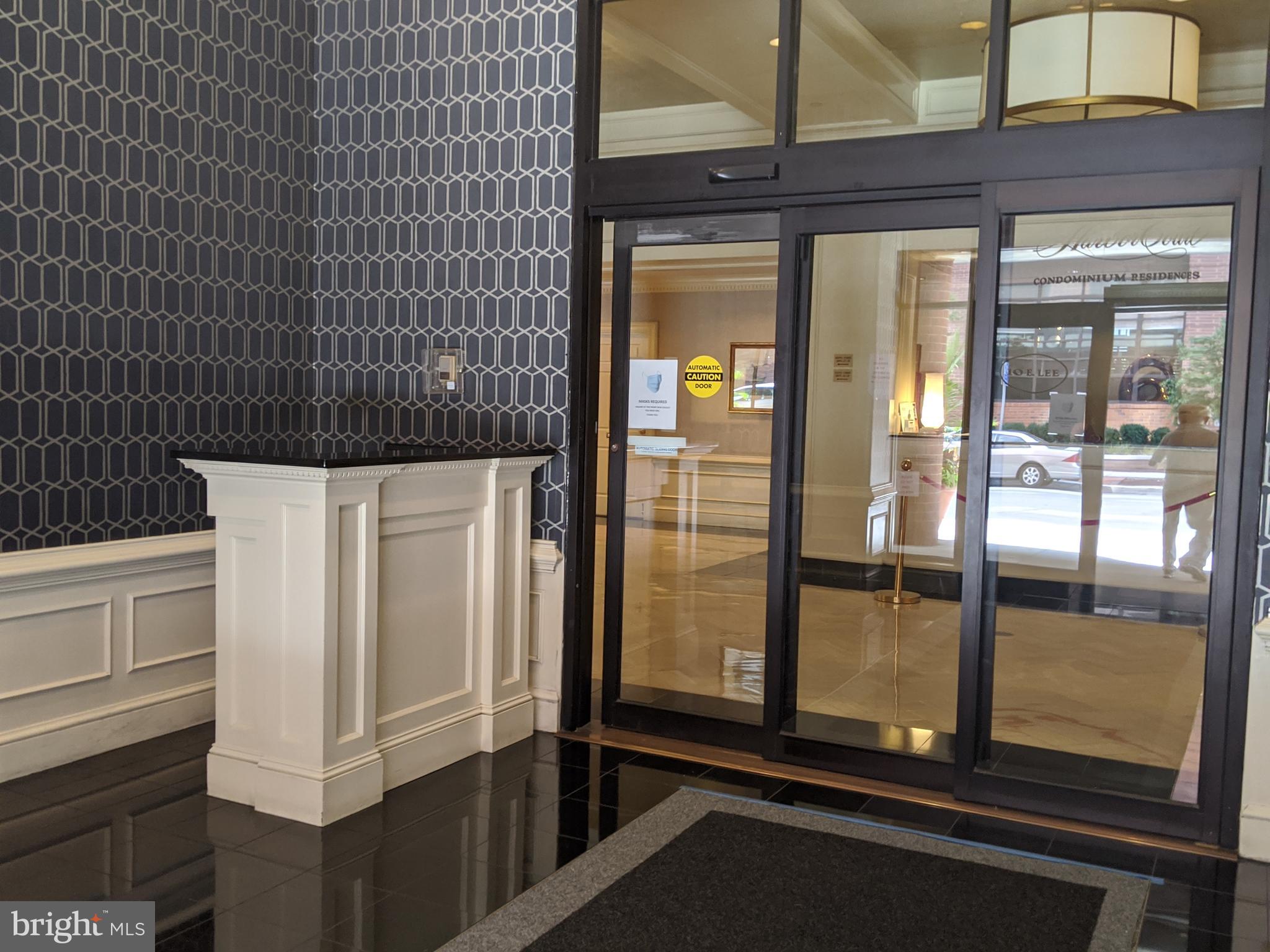10 East Lee Street, Unit 1208 Baltimore, MD 21202 - Photo 3 of 43 Building Entrance
