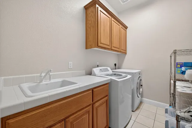 a view of a workspace with furniture and windows