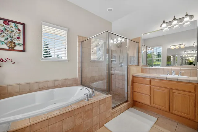 a view of yard with swimming pool and green space