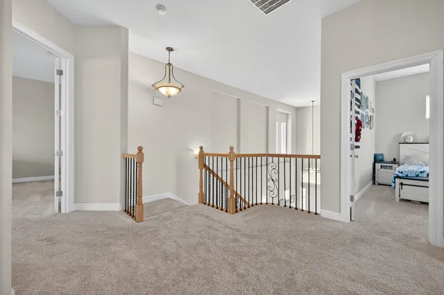 a front view of a house with a swimming pool