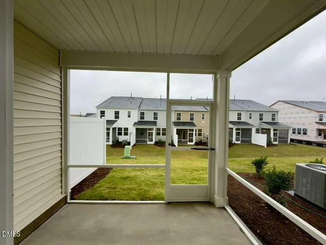 a view of an chairs and tables in the patio