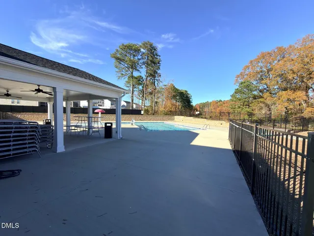 a view of a park with swings and slides