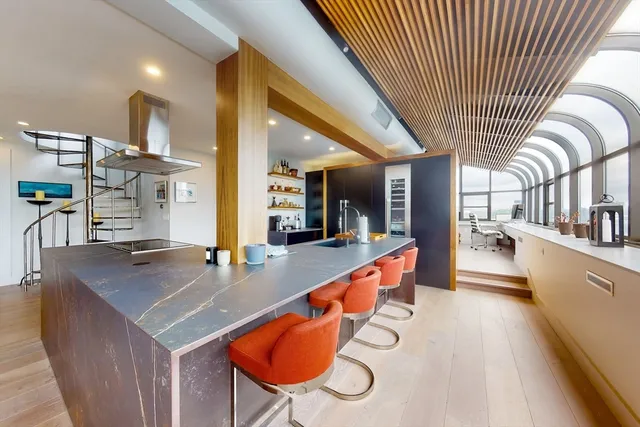 a kitchen with stainless steel appliances granite countertop counter space a sink and cabinets