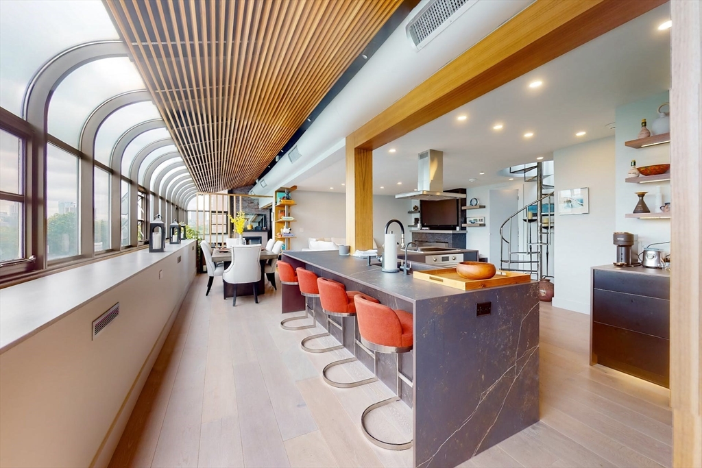 270 Beacon Street, Unit H5 Boston, MA 02116 - Photo 17 of 38 a kitchen with stainless steel appliances granite countertop lots of counter top space