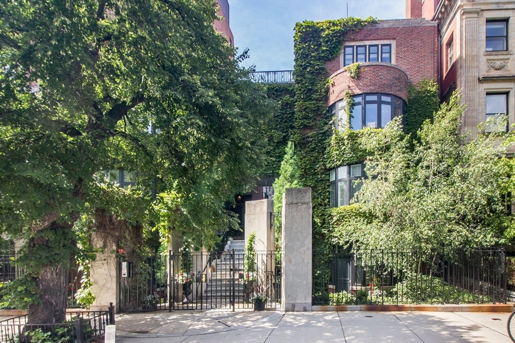 270 Beacon Street, Unit H5 Boston, MA 02116 - Photo 35 of 38 a front view of a building with trees