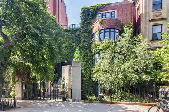 a view of a building with a street